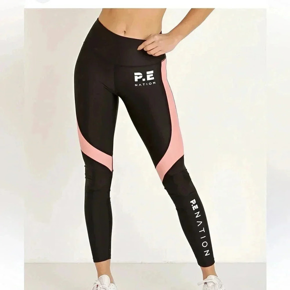 P.E. NATION  The Chasse Legging Black/Salmon
Regular price$140 Size Large - Picture 1 of 6